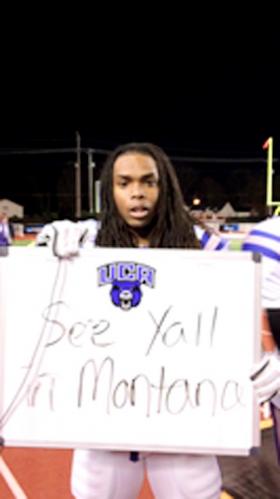 University of Central Arkansas’ Rojae Jackson holds up a sign for UCA fans after the Bears’ 34-14 win Saturday over Tennessee Tech in the NCAA Division I Football Championship Subdivision playoffs. As Jackson’s sign indicates, UCA will play at Montana next week. DAVID MCCOLLUM PHOTO
