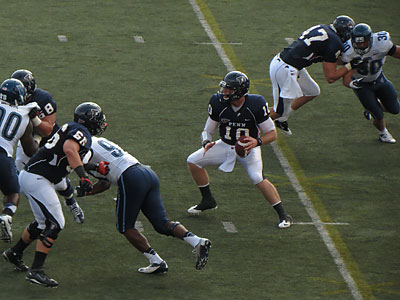 Penn quarterback Billy Ragone surveys the field from the pocket, 9/22/2012