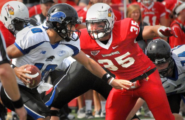 Illinois State University's Colton Underwood (35) closes in for a sack on Eastern Illinois quarterback Jimmy Garoppolo (10), in the first half of play at Hancock Stadium in Normal, Saturday Sept. 15, 2012.