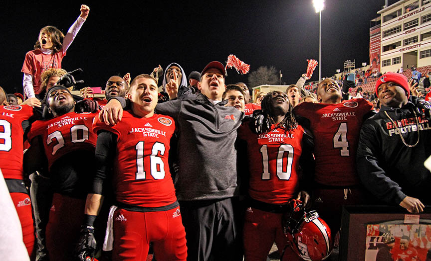 Jacksonville State coach John Grass sings I'll Fly Away with players and fans following the FCS semifinal football game at JSU Stadium in Jacksonville, Ala., Saturday, Dec. 19, 2015. (Dennis Victory/al.com)